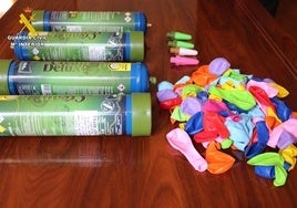 Botellas de gas de la risa y globos incautados por la Guardia Civil.